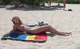 Blonde girls getting naked on beach